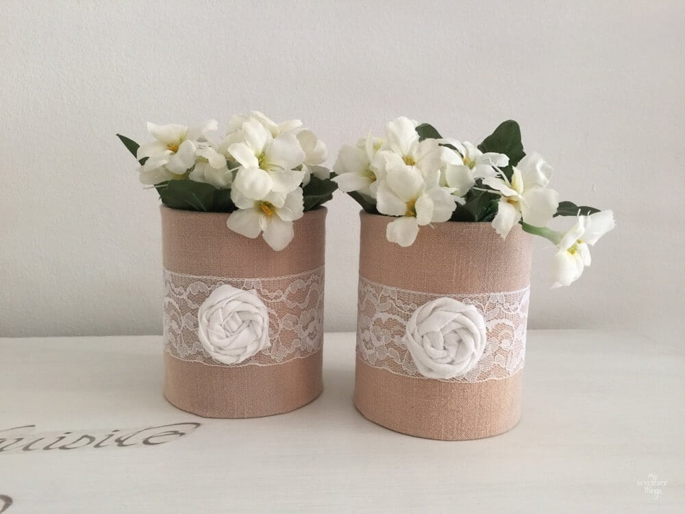 Fabric wrapped tins to get some pretty vases, and easy and cheap DIY