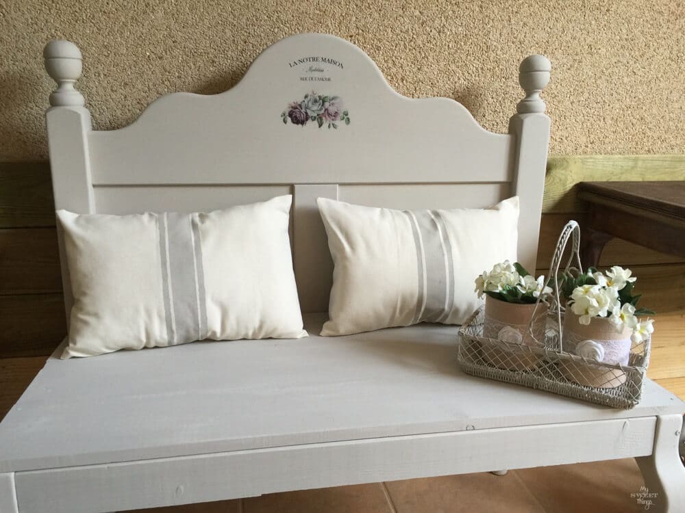 How to repurpose a headboard into a bench and make it French style with a graphic and some grain sack style pillows