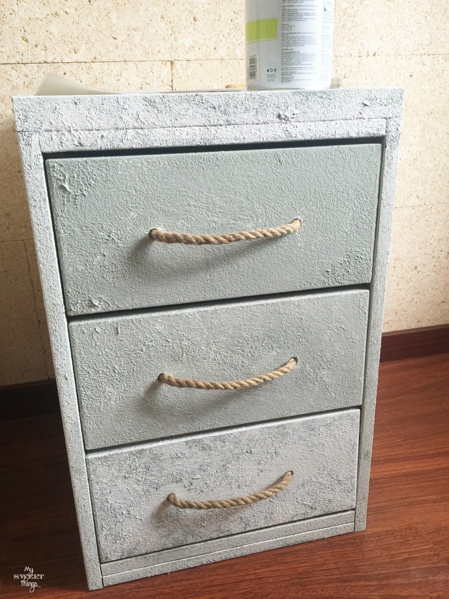 Coastal filing cabinet makeover using Saltwash for a coastal and weathered look with rope as handles