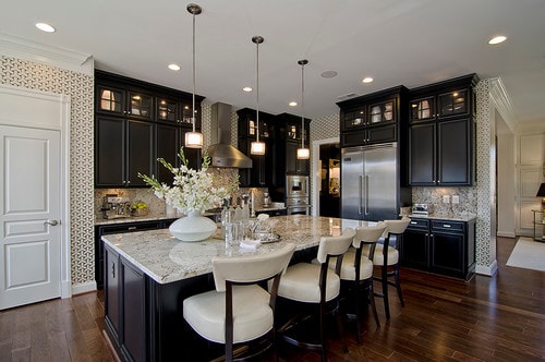 Traditional kitchen with granite countertops black wood cabinets | My Sweet Things