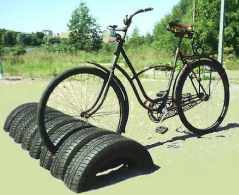 Standing bike rack · 15 Different Uses For Tires · Some easy ideas to recycle old tires · Via www.sweethings.net