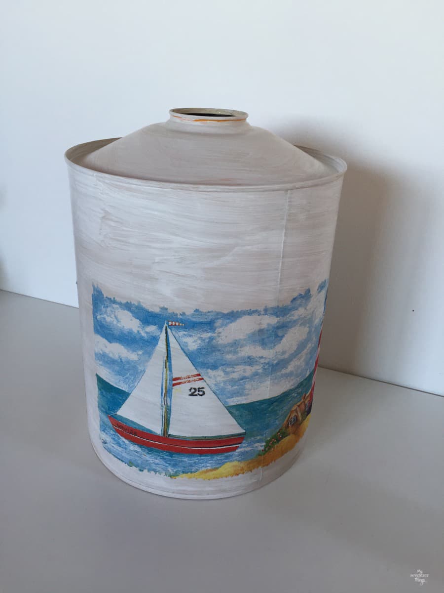 Coffee tin turned into nautical vase with paint and decoupage  ·  Via www.sweethings.net