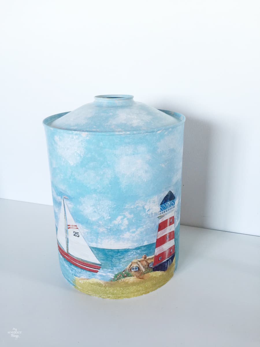 Coffee tin turned into nautical vase with paint and decoupage  ·  Via www.sweethings.net