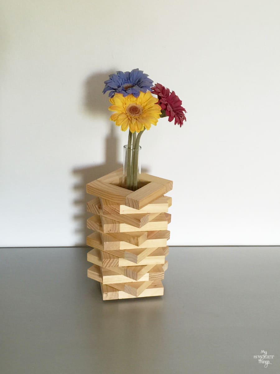 Flower vase out a Jenga game as DIY home decor on the cheap · Via www.sweethings.net