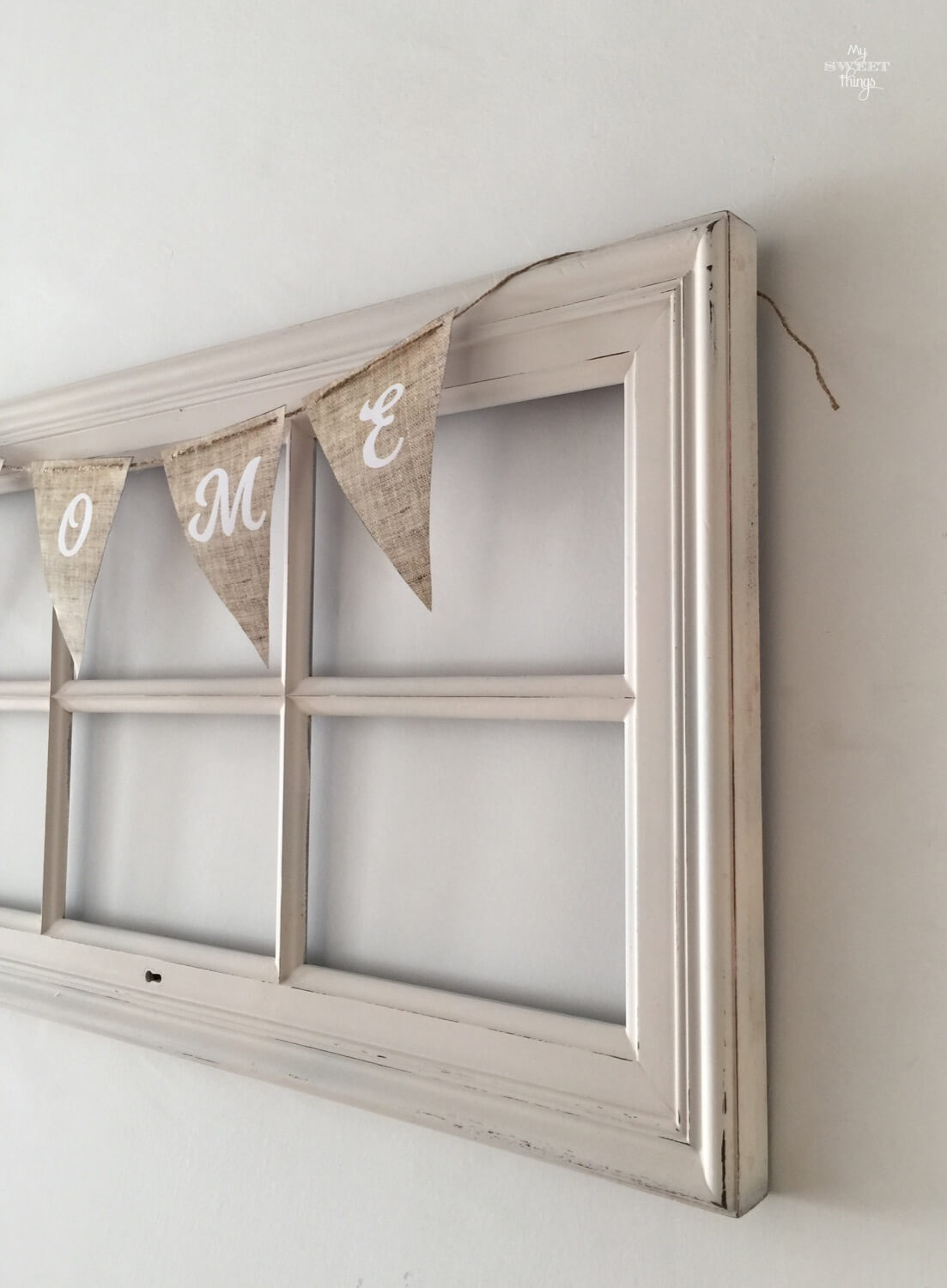 Old windows repurposed into home decor with pennant banner · Via www.seethings.net